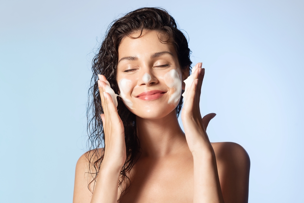 Smiling,Young,Woman,Washing,Foam,Face,By,Natural,Foamy,Gel.