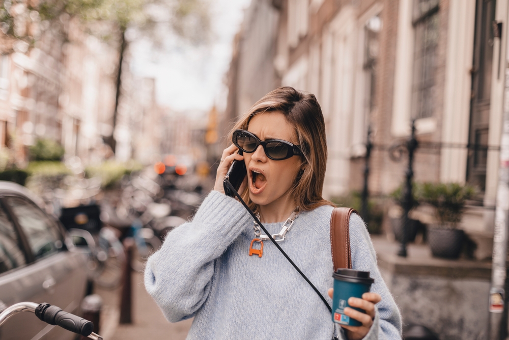 Shocked,Anxious,Young,Woman,Receiving,Offending,News,Over,Her,Cell, gossip