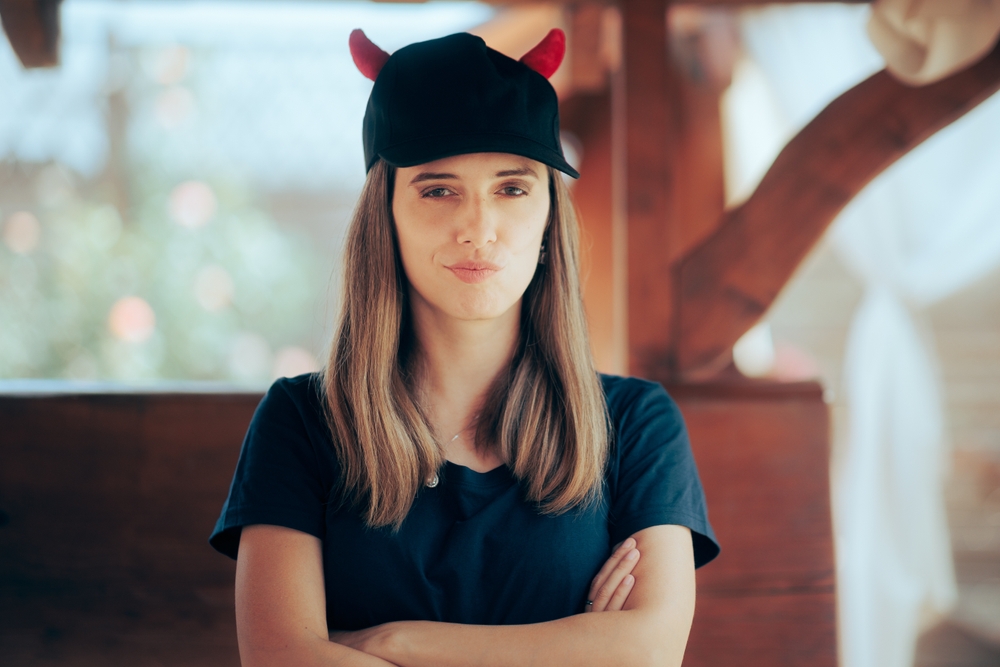 Upset,Girlfriend,Wearing,A,Devil,Horned,Hat,Looking,Displeased.,Woman, upset, passive aggressive